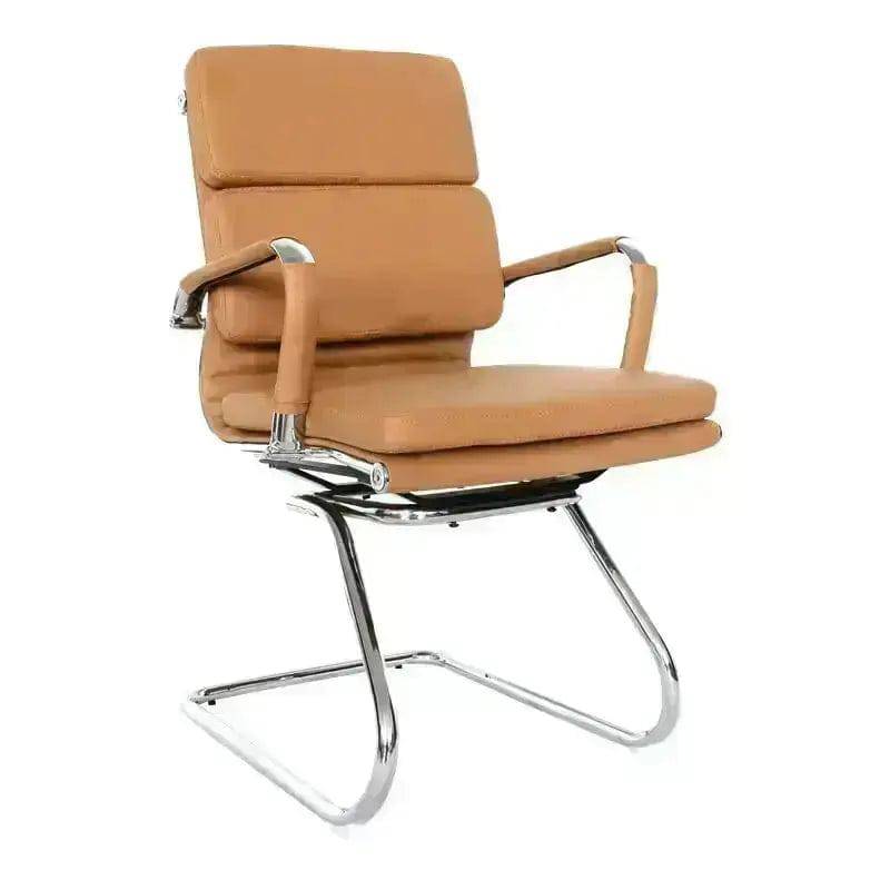 Tan leather office chair with chrome base, part of classic Eames Cushion Visitor line